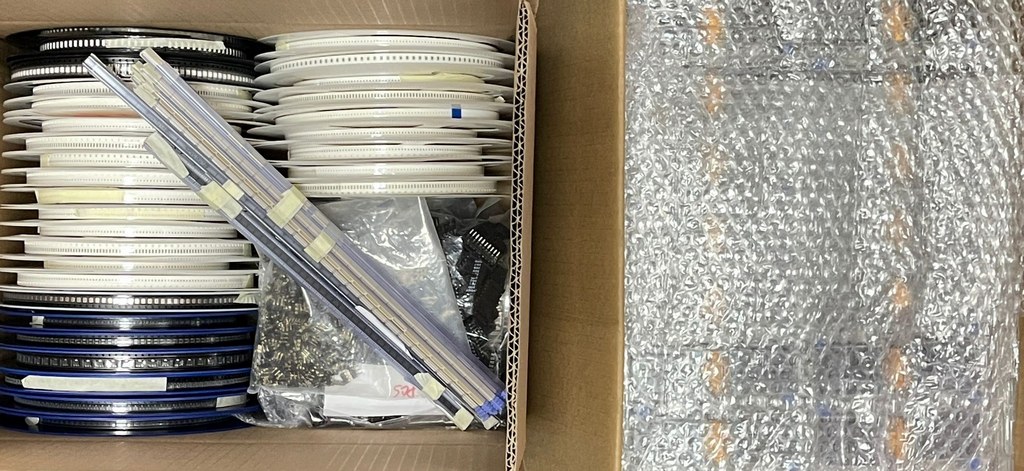 Boxes with reels of components ready for assembly